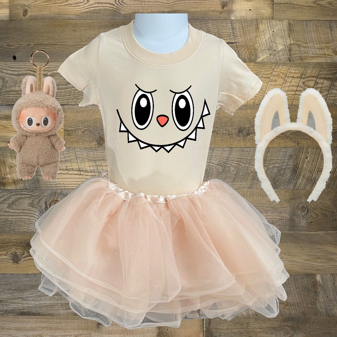 Toddler Girls LABUBU Tan 4 Piece Tutu Halloween Costume Includes Tshirt Tutu Headband and Lafufu Doll NEW | MakerPlace by Michaels Toddler Girls LABUBU Tan 4 Piece Tutu Halloween Costume Includes Tshirt Tutu Headband and Lafufu Doll NEW | MakerPlace by Michaels